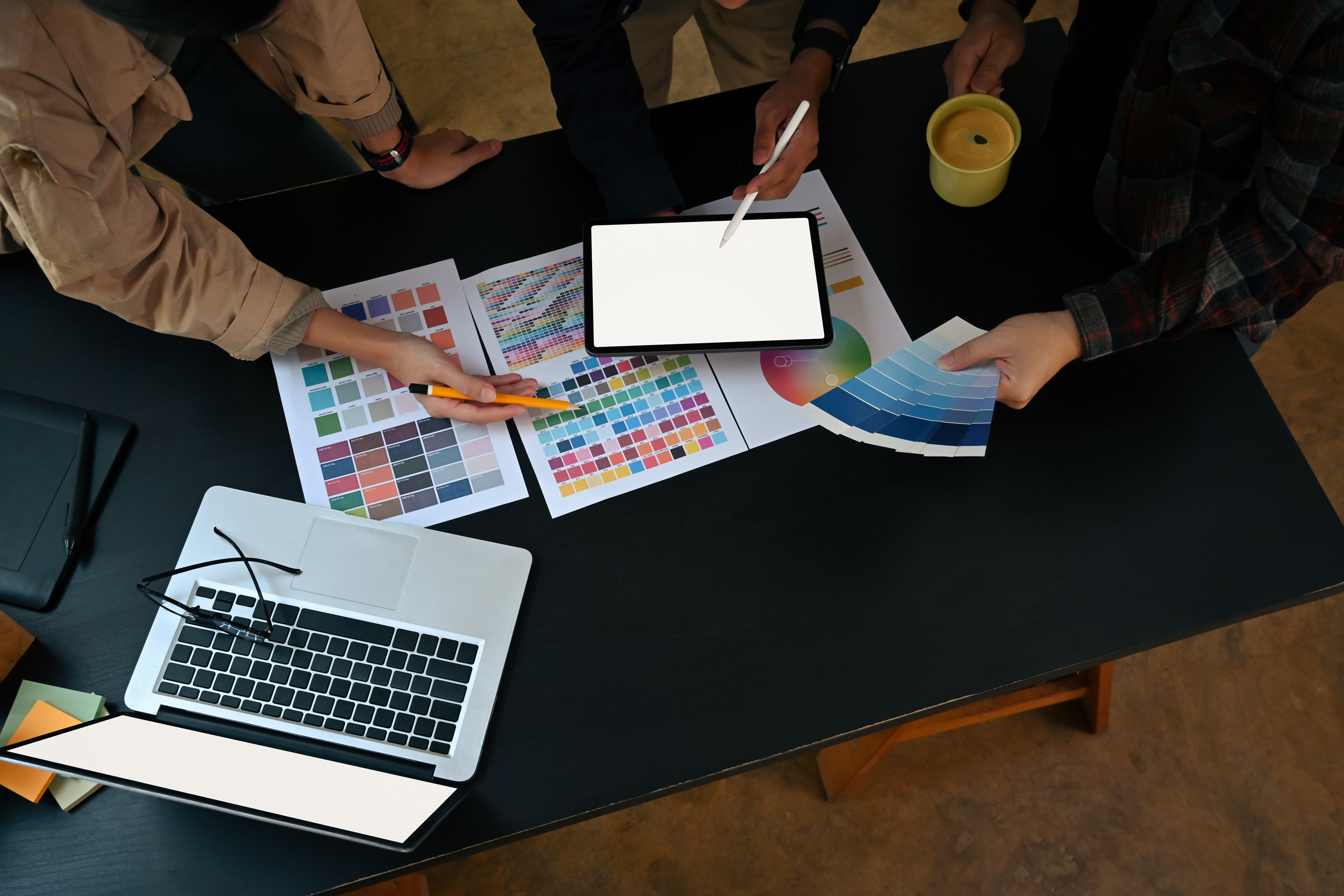 People Reviewing Graphic Projects